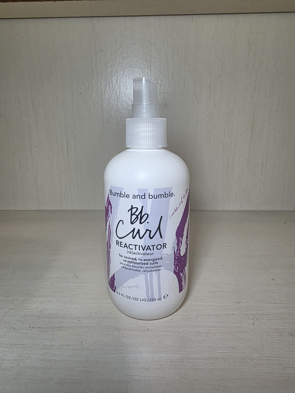 Bumble and bumble White Bottle with Purple Label Curl Reactivator
